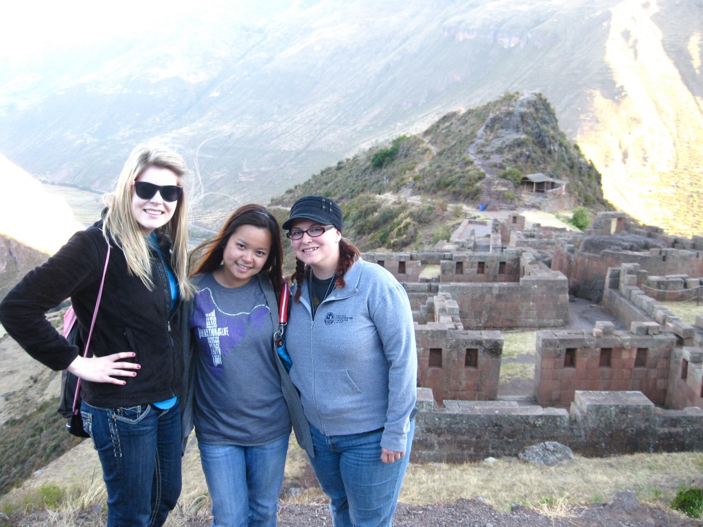 We drove up the mountains and stopped twice for pictures of the Cuzco valley and Inca valley. We later climbed down Pisac (the first Inca ruins) for 2.5 hours.Left to right: Kim, Chinh (me) and Ravae took a picture in front of the Pisac ruins. 